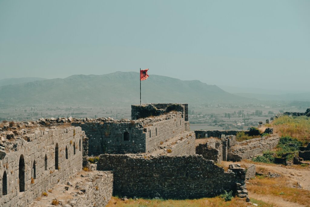 Explore the ancient ruins of Rozafa Castle in Shkodër, Albania with a view of the surrounding landscape.