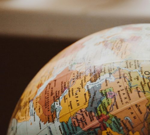 pexels-photo-335393-335393 Detailed close-up of a globe showcasing parts of Europe and Asia for world exploration concepts.